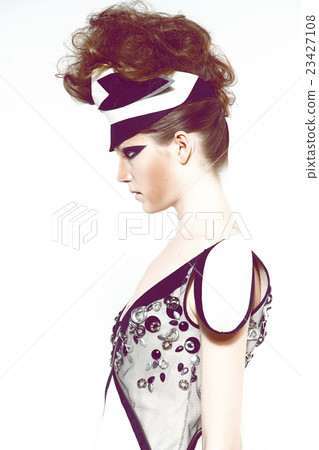 Girl in futuristic clothes Girl in futuristic clothes 23427108