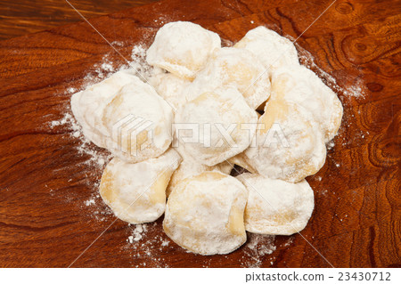 Tortellini on a wooden table Tortellini on a wooden table 23430712