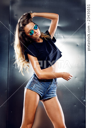 Beautiful model on grey background 23430831