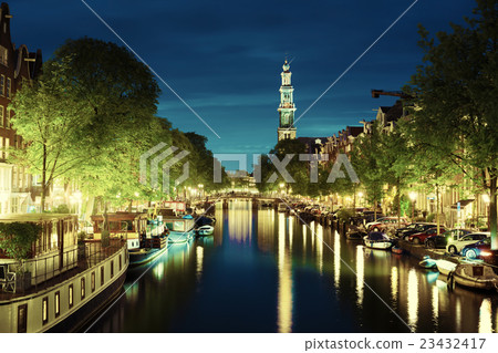 Westerkerk church tower at canal in Amsterdam, Netherlands Westerkerk church tower at canal in Amsterdam, Netherlands 23432417