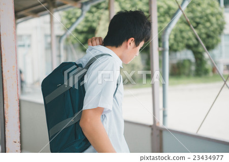 high school student, coming home from school, end of school day 23434977