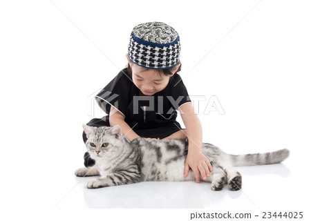 cute muslim child playing with tabby cat 23444025