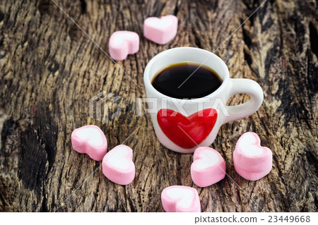 red heart on coffee cup and pink heart candy shape red heart on coffee cup and pink heart candy shape 23449668