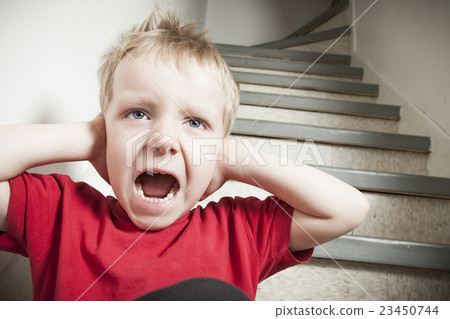 Neglected lonely child leaning at the wall Neglected lonely child leaning at the wall 23450744