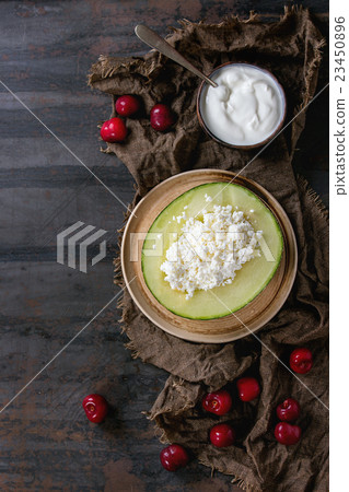 Cottage cheese in melon Cottage cheese in melon 23450896