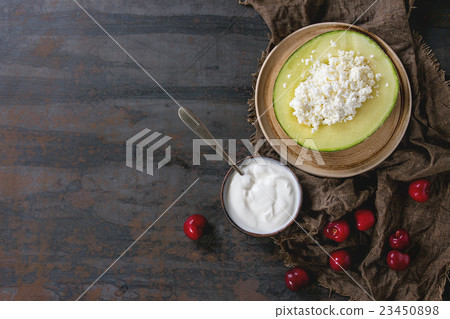 Cottage cheese in melon Cottage cheese in melon 23450898
