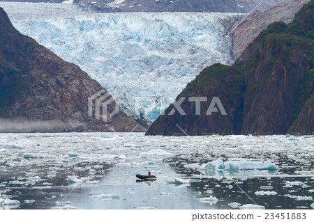 Man in Boat  and Sawyer Glacier in Alaska 23451883