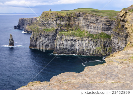Famous cliffs of Moher with tower. Ireland Famous cliffs of Moher with tower. Ireland 23452899