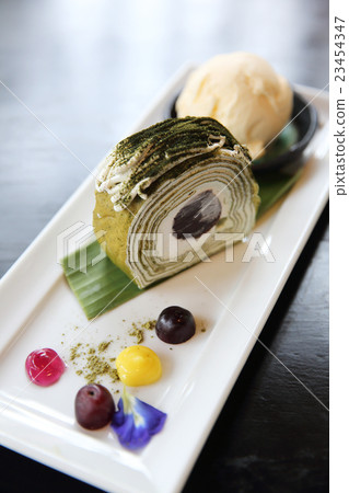 green tea roll cake with ice cream green tea roll cake with ice cream 23454347