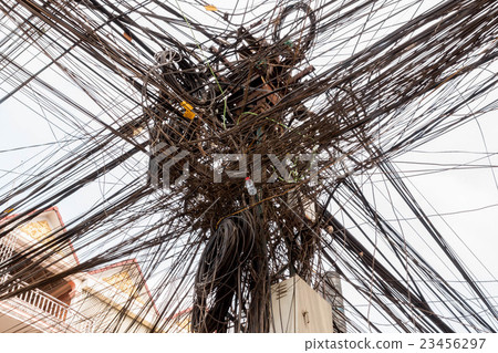 Telephone pole in Phnom Penh Cambodia crowded electric wire 23456297