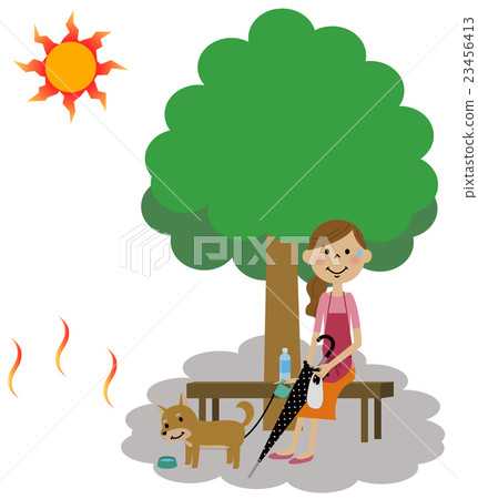 A woman walking taking measures against heat stroke A woman walking taking measures against heat stroke 23456413