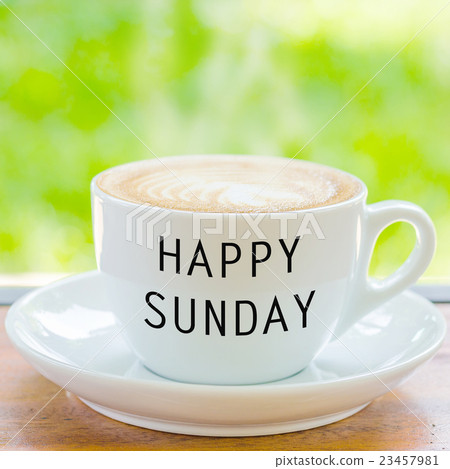 Happy Sunday on coffee cup over natural background Happy Sunday on coffee cup over natural background 23457981