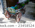 Old wagon with flowers 23458524