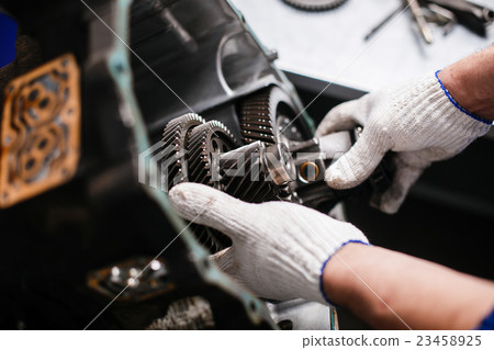 Cross-section of a car gearbox. mechanics work in 23458925
