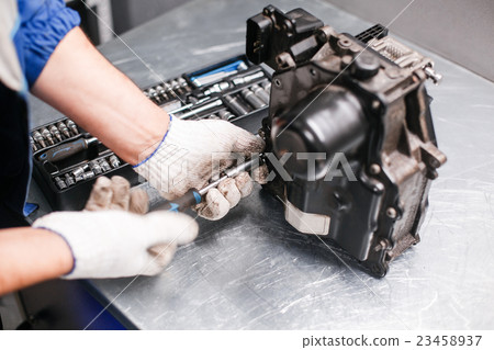 Cross-section of a car gearbox. mechanics work in 23458937