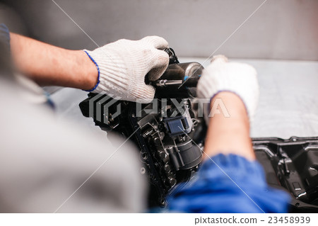 Cross-section of a car gearbox. mechanics work in 23458939