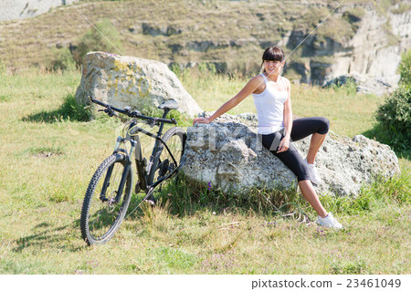 Mountain biking happy sportive girl relax in 23461049