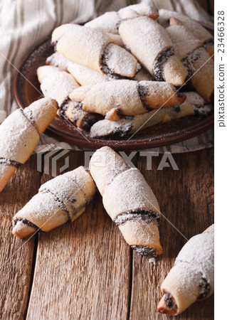 crescent rolls with poppy stuffing close-up crescent rolls with poppy stuffing close-up 23466328