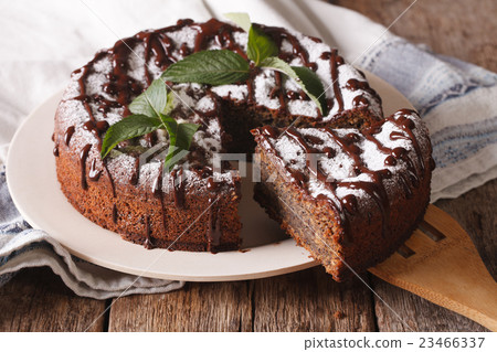 Tasty cake with poppy seeds, decorated with mint Tasty cake with poppy seeds, decorated with mint 23466337