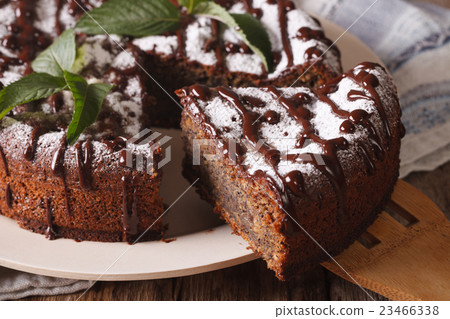 Tasty cake with poppy seeds and powdered sugar Tasty cake with poppy seeds and powdered sugar 23466338