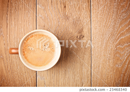 Coffee Cup On Wooden Table 23468340