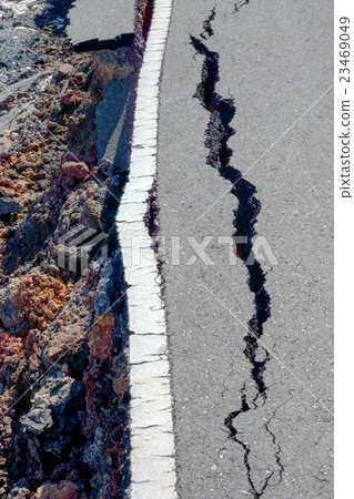 Fissures and erosion of the asphalt road Fissures and erosion of the asphalt road 23469049