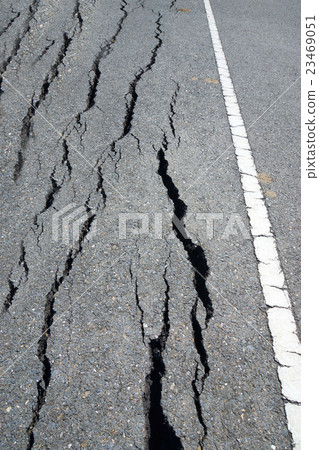 Fissures and erosion of the asphalt road Fissures and erosion of the asphalt road 23469051