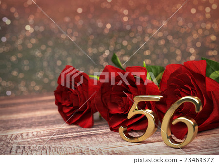 birthday concept with red roses on wooden desk 23469377