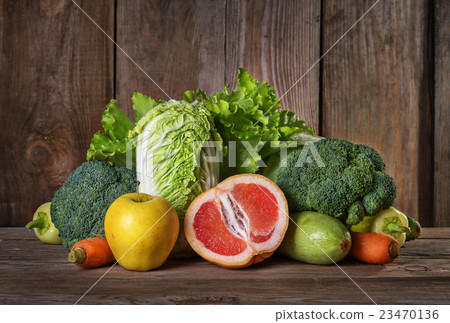 vegan foods on the old wooden background 23470136
