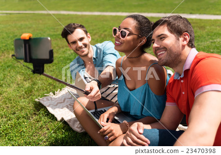 Modern youth relaxing outdoors Modern youth relaxing outdoors 23470398
