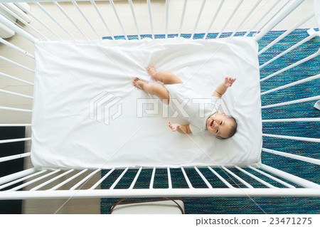 the top view of baby in cot, cradle 23471275