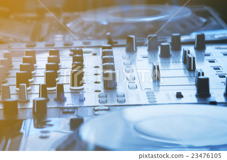 DJ console mixing desk in cool tone DJ console mixing desk in cool tone 23476105