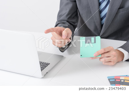 Business scene Male floppy disk 23479403