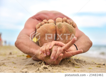 yoga man showing peace symbol 23481461