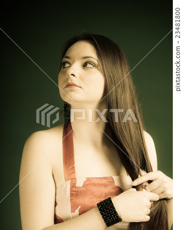 Long haired woman in summer dress. 23481800