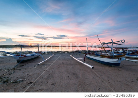 Reflection Sunrise in Tanjong Benoa with boat 23486389