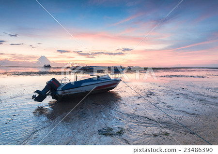 Reflection Sunrise in Tanjong Benoa with boat 23486390