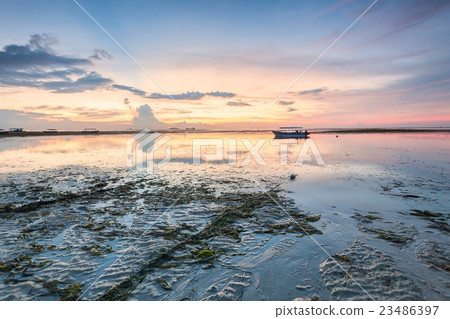 Reflection Sunrise in Tanjong Benoa with boat 23486397