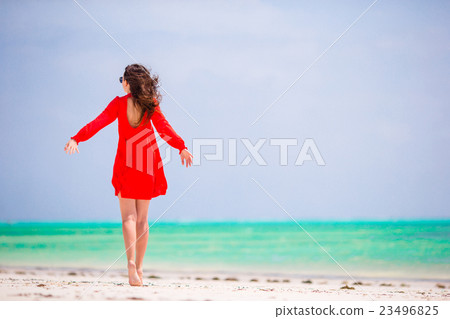 Young beautiful woman on beach vacation 23496825