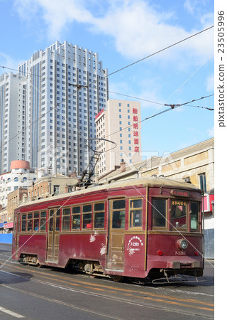 An old 3000-type tram made by Nippon Sharyo that runs through the old Japanese town of Dalian, China. An old 3000-type tram made by Nippon Sharyo that runs through the old Japanese town of Dalian, China. 23505996