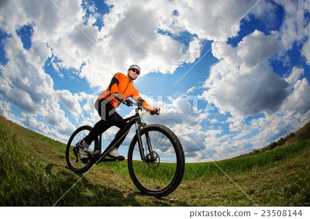 Cyclist on the Beautiful Meadow Trail 23508144