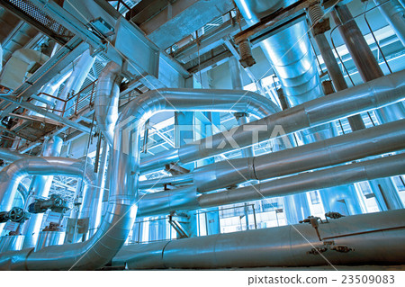 different size and shaped pipes and valves 23509083