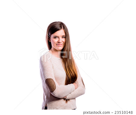 Girl in brown sweater, young woman, studio shot 23510148