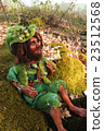 fairy doll handmade figure sitting on stone in 23512568