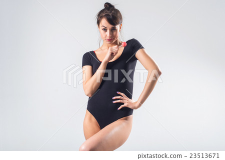 Young brunette model with lollipop studio shot on Young brunette model with lollipop studio shot on 23513671