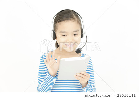 Girls talking with tablets and headsets 23516111