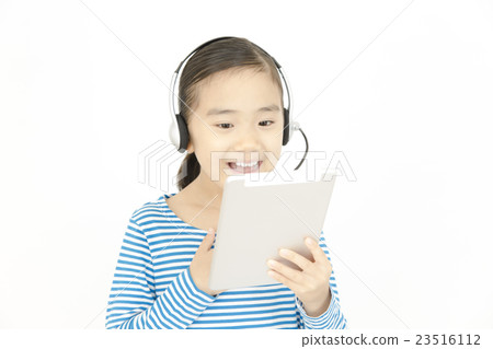Girls talking with tablets and headsets 23516112