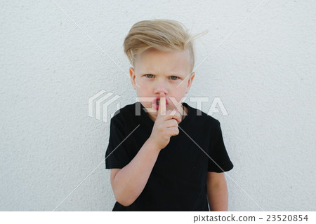 young emotional boy on bright background 23520854