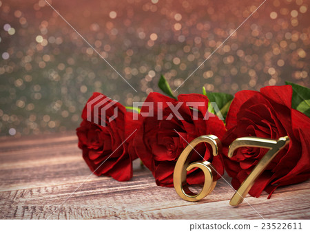 birthday concept with red roses on wooden desk 23522611