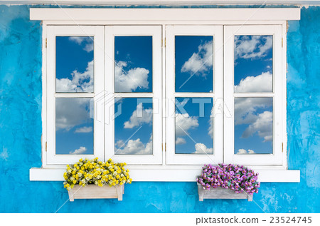 Beautiful Flowers Outside a Window with cloud on blue sky Beautiful Flowers Outside a Window with cloud on blue sky 23524745